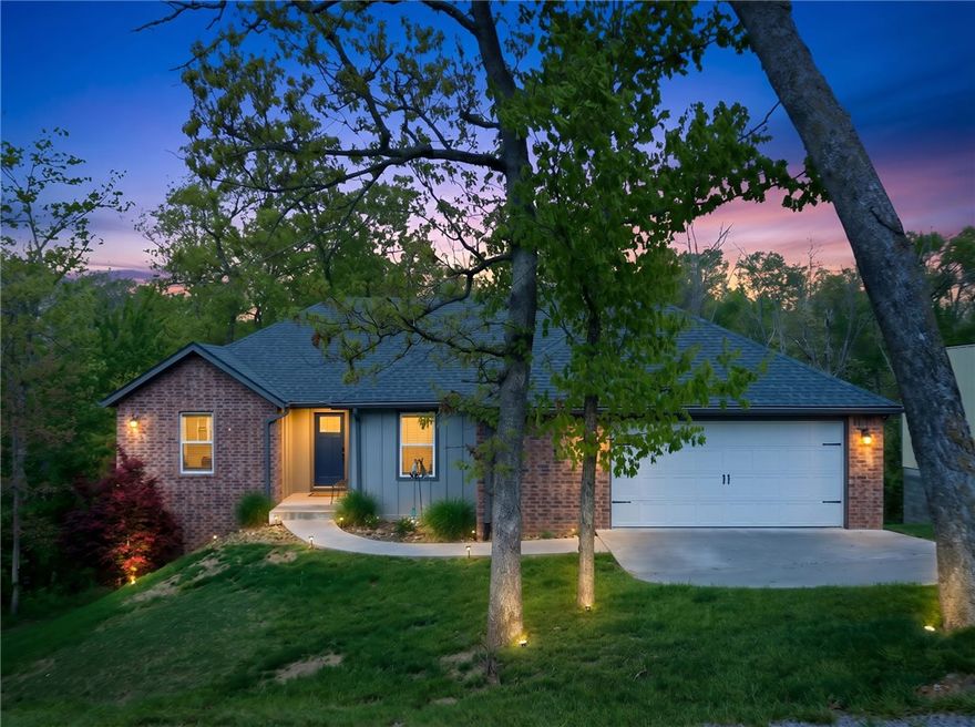 Tucked among the trees in beautiful Bella Vista—home to some of the nation’s most sought-after mountain biking trails—this rare 6-bed/3-bath home offers the perfect blend of outdoor adventure & peaceful retreat. With 2,816 sf, & designed with both comfort & functionality in mind, the home features granite countertops, 2 living spaces, & an oversized garage with room for all your bikes, gear, & equipment that comes with an active outdoor lifestyle. The thoughtfully designed laundry rm connects directly to the prim. closet for everyday convenience, while the newly remodeled prim. bath showcases an expansive spa-like walk-in shower. Step outside to the oversized back porch, where you can relax in total privacy surrounded by nature. The backyard offers a gentle slope that preserves the natural landscape while remaining highly usable. Located minutes from the renowned Back 40 trail system, this home is ideal for outdoor enthusiasts seeking space, privacy, & direct access to the Bella Vista lifestyle & all its amenities.