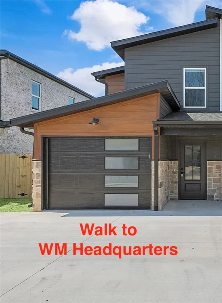Welcome To Your Next Home! Situated In A Reviving, Established Neighborhood, Just Steps Away From The Brand-New Walmart Campus, This 4-Bedroom, 2-Bathroom Single Family Attached Homes Blends Comfort With Convenience. Imagine Waking Up In Your Spacious Main-Floor Primary Bedroom, Sipping Coffee In The Sun-Filled Kitchen. Upstairs, You'll Find Three More Bedrooms, Perfect For Guests, Home Offices, Or Whatever Your Life Needs. The Fully Fenced Backyard Offers A Safe, Private Space For Outdoor Fun Or Quiet Evenings Under The Stars. Whether You're Headed To Downtown Bentonville Or Exploring The Best Of Northwest Arkansas, You're Just Minutes Away From It All. This Is More Than Just A House—It's A Place To Create Memories, Share Laughter, And Truly Feel At Home. Homes In This Area Are Going Fast As The Neighborhood Continues To Grow, Transition, And Add Value—Schedule Your Showing Today Before This One Slips Away!