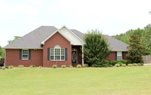 This stunning 2409 sf home features an elegant formal dining room, large kitchen with granite countertops and ample cupboard space, breakfast nook, a lovely living room with fireplace and beautiful built ins, and a huge master and master bath with jacuzzi tub and walk in shower. A large back yard is the setting for a charming covered patio and vinyl storage building with existing shelves.