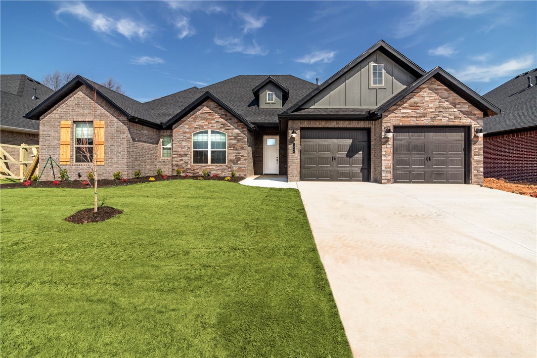 Smartly designed, new construction home with open concept floor plan! Some features include a gas fireplace, solid surface flooring in the living areas, ceramic tile in the wet areas, carpet in the bedrooms, granite counters through out, stainless appliance package, covered back porch with wiring for cable and plumbing for gas grill, cellulose insulation, low e windows, insulated garage doors, gas water heater, privacy fenced back yard, full gutters, 2" faux wood blinds, and more.