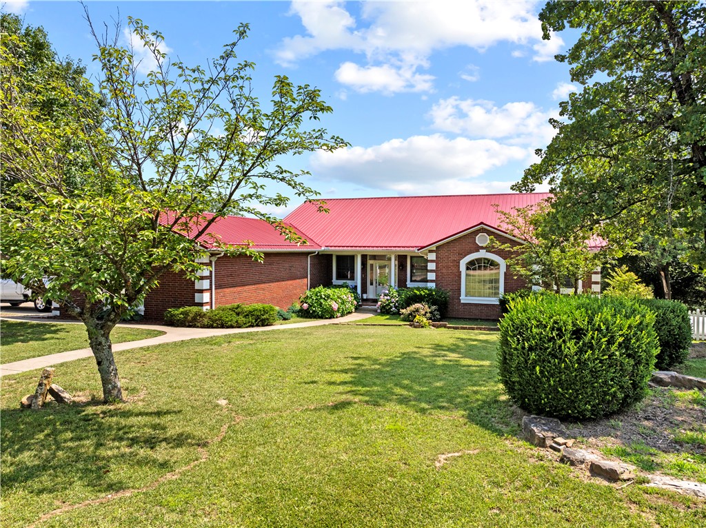 This spacious home is perfect for the whole family. 3 bedrooms & 2.5 baths on the main level, all new beautiful hardwood floors, office with fireplace, formal dining room that shares a 2-sided fireplace with the Family room. Kitchen with bar/island & lots of cabinet space, a pantry, laundry/mud room & 2 car garage. Walkout basement gives you an additional bedroom, Bonus room, full bath, large family room with fireplace, game room, a storm shelter, tons of storage and a John deer room for your yard toys or projects. The home has a whole house generator with it's own 500 gal Propane tank, separate 1000 gal tank for the home, extra insulated with steel beams, extra wide hallways & doorways, Central Vac System, & an abundance of built-Ins. 24 x 24 Shop building with steel beams and overhead door. There are two separate covered back decks the length of the home where you can relax & enjoy the views of the mountains & prepare a meal from your enclosed grill station. Call today for an appointment to see this gem.