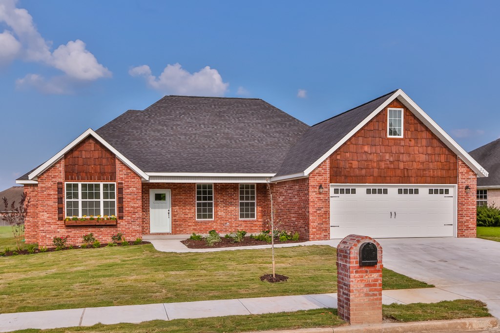 Beautiful new home in established neighborhood. All of the amenities you could ask for in a new home. Front room could be an office or bedroom. Great bonus room with closet. Kitchen has white custom cabinets in kitchen, farm house sink, pot filler, gas range with vented hood, subway tile backsplash and lots of storage. Home is built like a custom. Deep garage for more storage. Bonus room has its own heat and cooling system. Wood floors, painted brick fireplace with large mantle. Come take a look today!