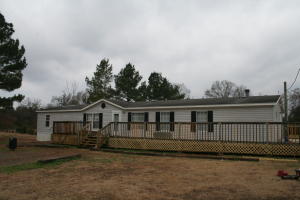 Lots of space and room to grow. 4 bedrooms, 2 full bathrooms, Living room, Den with Fireplace and Large Kitchen, all on 1 acre of land. If you need space them don't miss out on this deal. Room for animals, nice deck, and all appliances to convey including washer and dryer. Some new flooring, paint, plumbing, underpinning and more. CH/A about 1 1/2 yrs old.