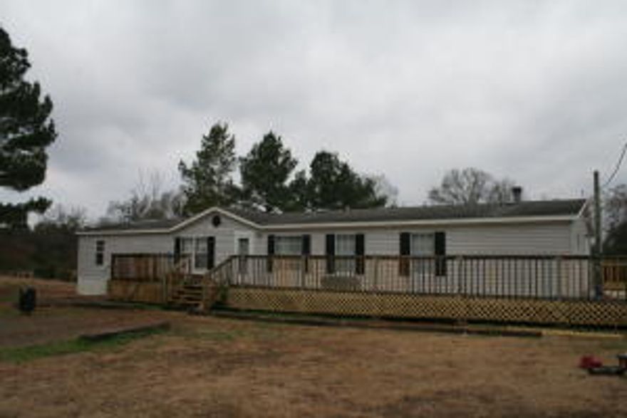 Lots of space and room to grow. 4 bedrooms, 2 full bathrooms, Living room, Den with Fireplace and Large Kitchen, all on 1 acre of land. If you need space them don't miss out on this deal. Room for animals, nice deck, and all appliances to convey including washer and dryer. Some new flooring, paint, plumbing, underpinning and more. CH/A about 1 1/2 yrs old.