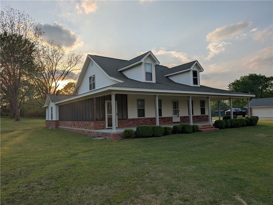 WILLING TO SUBDIVIDE. Nestled in the river valley between the Ozark and Ouachita Mountains, this 13.93-acre property includes two homes totaling 4,504 sqft (3,194 sqft primary home, 1,310 sqft in the second). Just 15 mins from Mt. Magazine, enjoy trail riding, nearby lakes, and scenic views. Both homes share access to an in-ground storm shelter, a pond, partially fenced land ideal for cattle, and a camper storage building. The main home offers 4 beds, 3 baths, a 2-car garage with attic storage, screened back and side porches, and a large upstairs bonus room. The second home is great for extended family, Airbnb, or rental and features 3 beds, 1 bath, an office, spacious living, and a 2-car garage. Located just a half-mile from Paris High School and minutes from downtown and the local shopping area, this property offers natural beauty, space, and versatility—perfect for family life, retirement, or investment. Other Listings associated with this property include MLS #'s 1321295, 1321348, 1321351.