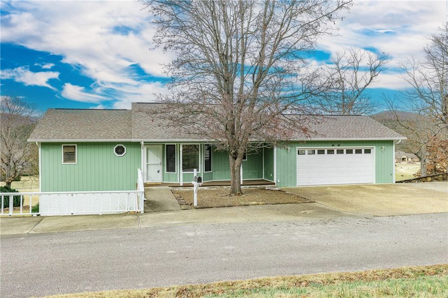 This beautifully updated home offers a prime golf course setting with scenic views and a relaxing  lifestyle. 
The kitchen has been fully updated with a new dishwasher and  new quartz countertops, a reconfigured layout, and a stylish bar-top opening that enhances flow and functionality. 
A new 50 gal water heater was installed 2 years ago for added efficiency. 
New flooring and fresh paint throughout the home give it a a clean, modern feel while preserving its warm and inviting character.  
The roof was fully replaced in 2024 providing a major long-term improvement for the next owner. 
The home is also well insulated keeping utility costs consistently low. 
Enjoy the convivence of being just minutes from the community pool, marina and beautiful lake. 
This is a golf-cart-friendly community where residents easily access amenities, trails, and recreation. 
With  thoughtful updates, a great layout, and a peaceful location, this home is a fantastic opportunity to enjoy comfort, convivence, resort-style living.