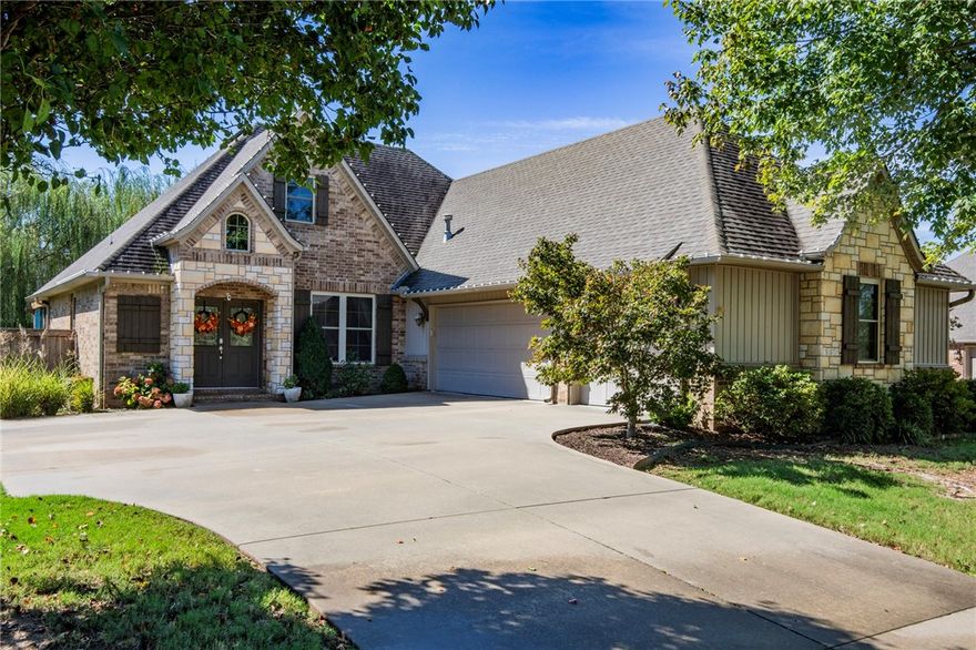 Beautiful Fayetteville home in sought-after Mountain Ranch! This 4-bed, 2.5-bath gem is close to schools, shopping, gyms, and restaurants. A charming courtyard entry with double doors opens to a living room with gas-log fireplace and a formal dining room. The eat-in kitchen features ample cabinetry, bar seating, and a walk-in pantry. The private primary suite includes a jetted corner tub, updated shower, dual basin sinks, and updated countertops. A guest powder bath is conveniently off the entry. Step outside to a pergola-covered backyard retreat with a willow tree, stamped concrete path, and garden area. Upstairs offers 3 large bedrooms, a HUGE bonus room with closet, and a dual-vanity bath. Overlooking a tree-lined green space, this home is in a neighborhood with 2 pools, playground, and community center. Walking distance to Owl Creek Elementary and Colbert Middle School! Also walking distance to the Fayetteville Boys & Girls Club with pools, rock-climbing, basketball, pickleball and more!