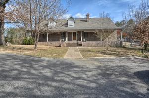 Bring your horses, cows, kids and ATV's because this gorgeous property can handle them all! 3/2, 1815 sq ft home with solid hardwoods, huge kitchen, split floor plan with jack and jill bath for the guest rooms, master suite with double closets, jetted tub and seperate shower. Huge laundry room with a shower for those dirty days in the shop or the barn. Detached Barn/ Workshop as well as a 2 car