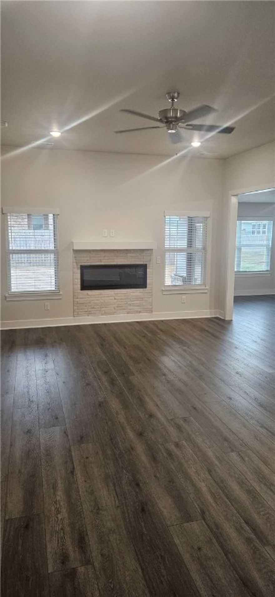 Great home in Towne West S/D. The 'Veronica' plan features 4 bedrooms, 2 bathrooms, 2 car garage, nice bonus room that could be used as a 4th bedroom, wood floors, quartz countertops, split floor plan, linear fireplace in living room, large open kitchen with pantry and dinning area. Big master suite complete with huge walk in closet, separate shower, double vanity. Covered back patio & much more!