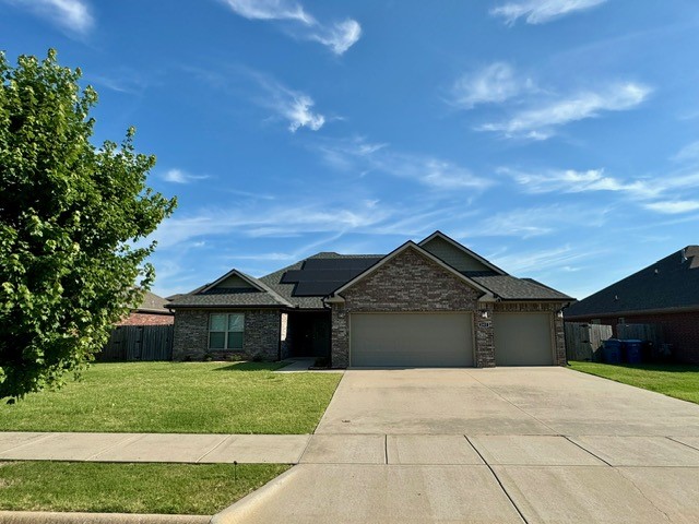Beautiful, well kept 4 bedroom, 2.5 bath Single Family home with 3 car garage. This Home has solar panels which means little to no electric bill! Lots of amenities like 3 cm granite counter tops, gas log Fireplace in Living Room, hardwood floors, wood look ceramic tile throughout, double vanities in bathrooms, large walk in master closet, ceiling fans, covered patio with an extended uncovered patio and an immaculate fenced in backyard. Close to schools, parks, and shopping. Only small pets allowed.