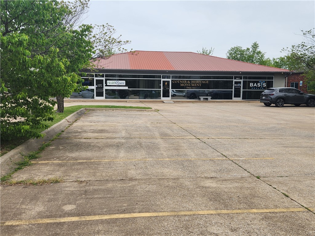 Rare Non-recourse Loan available with Owner Financing Available. Well kept building with excellent newer finish out in the 3 suites. Terms include: 25% down, 3-5 years interest only with 20 year amortization at 6% interest. Terms may be flexible for your needs. Perennially well located and occupied office building approximately 1.5 miles east of I-49 along the North side of Huntsville Rd. Is just West of Central Junior High. Current tenants have been occupied for years but are on a month to month basis. Low maintenance building includes: metal roof, glass front and a front with large area concrete parking. Solid traffic and convenient for access to the region this location is ideal for service oriented tenants/owner occupant. Call for showing.