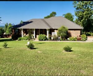 Beautiful, all elec home in country setting on 1 ac mins to downtown. Features split floor plan, tray ceiling, stainless appl, eat-in kitchen with great cabinets & french drs opening to nice deck, ofc or small 4th bdrm, faux wood blinds, walk-in closets & showers, closed in garage, with overhd & under house storage, large back lawn