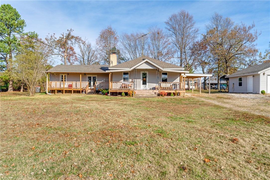 Remodeled home, within last five years, plumbing, bedroom, bonus room, porch,CHCA, windows, some electrical. 2 new bathrooms, located West Lowell, edge of city. 30X40 shop, 3 carports and new detached double garage all on level 1.5 serene acreage with scattered shade trees. This is a hard to find match with nice home, shop, storage buildings, and beautiful setting close to town. Lots of room for toy, cars, RVs and boats. 2-3 extra storage rooms in home. Price reduction of $20,000!
