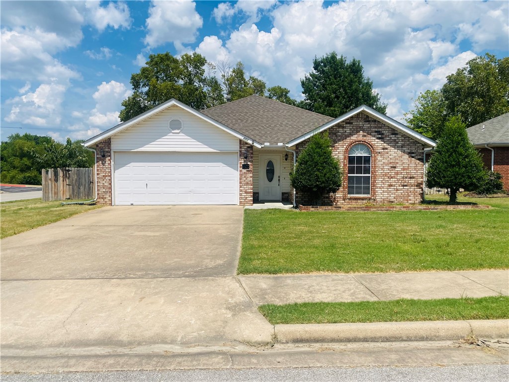 It's hard to beat this location! All brick with 3 BR and 2 BA on a corner lot. Privacy fenced backyard with a great floor plan. This house is a blank canvas with neutral colors and all hard surface flooring. Clean as a pin and ready to move into. Tornado shelter, new hot water heater. Located within walking distance of the Mary Mae Jones International School, Ruth Barker Middle School and the Bentonville High School Track and Field facility. A 2-3 minute drive to the new Wal-Mart World Headquarters Campus and Downtown Bentonville where you'll find the best in dining and entertainment, and Crystal Bridges Art Museum. Mountain biking, the Razorback Greenway and wonderful walking trails nearby. Great family home or investment property.