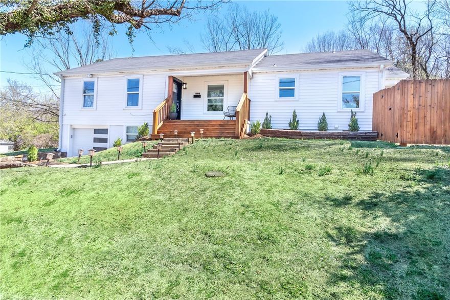 Located a few blocks from downtown on the edge of the Fayetteville Historic District! This leased and recently renovated home features 3 bedrooms, 2 baths and sits on a beautiful corner lot with mature trees, a covered front porch, and a new deck out back. Remodeled kitchen includes all new tile flooring, custom cabinets, lighting, granite countertops, backsplash, and stainless appliances. New windows, lighting, granite counters, and paint throughout. Both bathrooms completely remodeled and the original hardwood floors have been refinished! New front door, front steps, garage door, and wood privacy fence. This property is leased thru 5/31/25 for $3,300/month. Investors take note!