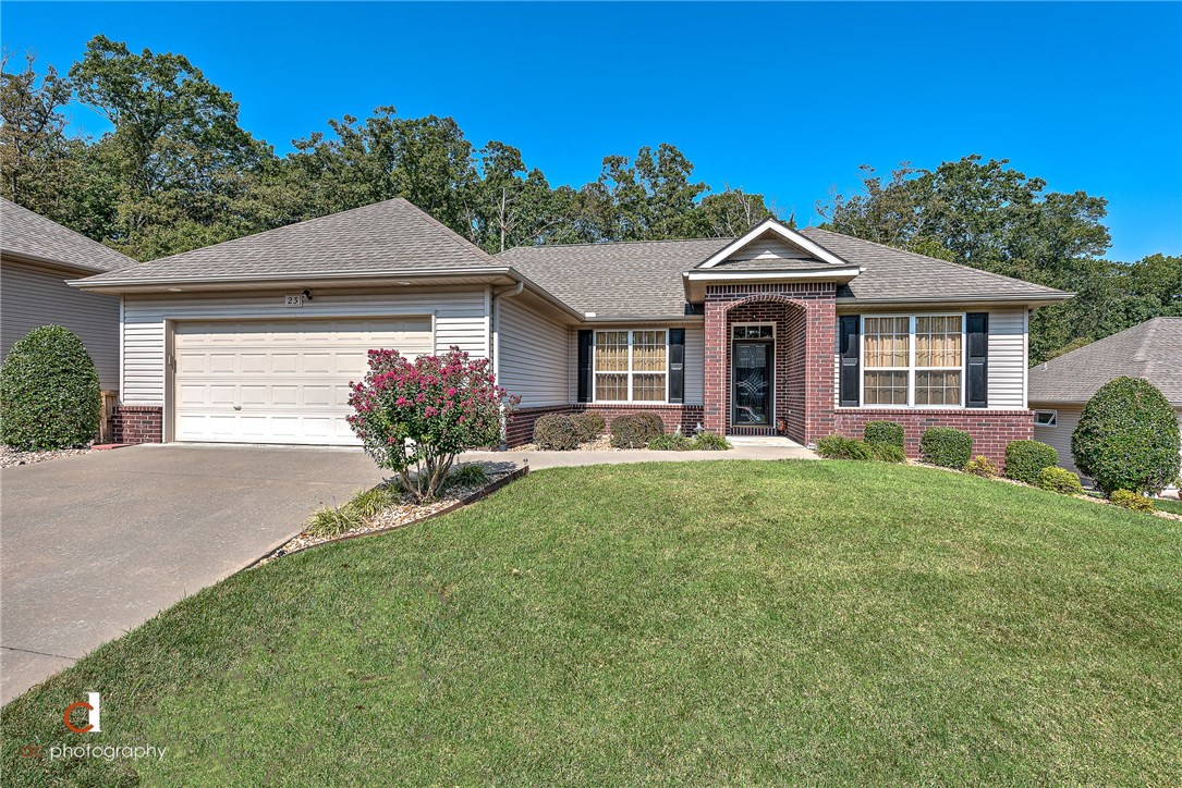 Care Free Living at its best! You will love the beautiful open concept of this home! Custom kitchen with huge open bar, quartz countertops, newer appliances and Pull-outs in cabinets! Open to a formal dining with beautiful chandelier, family room with corner fireplace and a light and airy sun room with custom Hunter blinds. Guest area can be completely shut off for privacy. French doors separate a lovely study. Large deck with arbor, huge Heated and cooled room below with cedar lined closet 470 Sq Ft