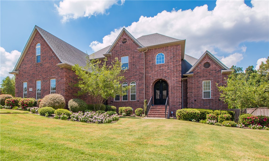 Updated home on corner lot in highly desirable Bentonville School District. Open floor plan w/cathedral ceilings, 2 living area, 2 gas fireplaces, 2 staircases, 2 master suites, bonus room, custom cabinets, SS appliances, 3 car garage, covered deck and 2nd level patio. Unbeatable location, minutes from Promenade, AMP, I-49. Also available for Sale ML#1029932