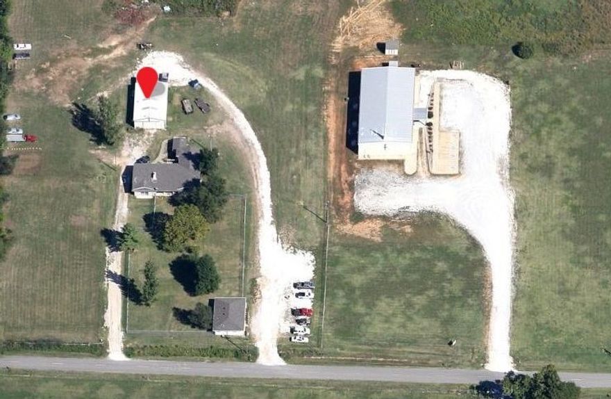 New I49 Ingress/Egress for Springdales Northern Bypass will make this property commercial frontage to new road.  1749 W. Graham Rd. with 3.9 acres (MLS#1126778) conveys with this property for a total of 8.7 total acres.  Church consists of sanctuary, Fellowship Hall, Kitchen, Men's and Women's restrooms.  Property will be subject to rezoning by City of Bethel Heights upon sale.