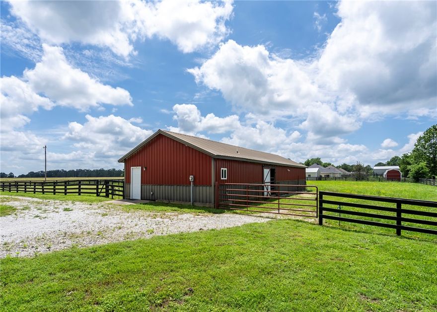 Endless possibilities await on this picturesque 30-acre tract of land! With rolling topography, approximately 15 acres in open pasture, and the rest in mature woods, the property offers a beautiful balance of open space & privacy. A scenic pond and natural spring at the back enhance the land’s natural charm.
A well-equipped barn adds significant value, featuring an office, tack room, and bathroom—perfect for equestrian use, hobby farming, or a base for future construction. Development potential is strong, with rural water and natural gas available at the road—making this property ideal for a private estate, hobby farm, or possible subdivision. Whether you're looking to build, invest, or enjoy...this property offers location, land, and infrastructure ready to support your vision. Also listed as Farm MLS 1310201.