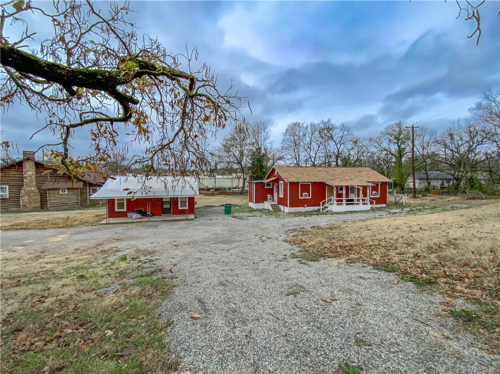 Many opportunities await you with this property. 2 homes in town, close to all amenities. This would make a great investment property or live in the 2-bedroom, one bath home and rent the 2-room cabin for additional income. Both homes have been refreshed with new flooring, paint and more. The property is zoned commercial. Cross referenced with mls# 1290756