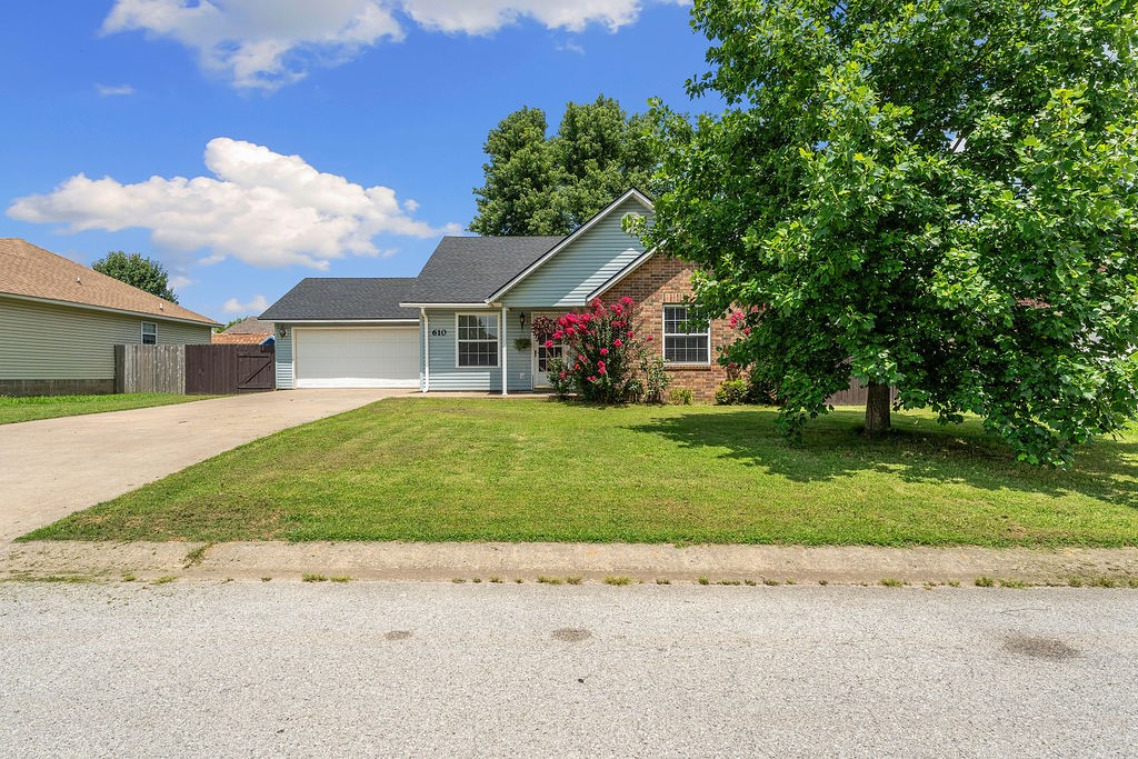 Welcome to this peaceful home with a secluded backyard. This ranch-style home has 3 bedrooms and 2 full baths. The kitchen has spacious countertops, lots of cabinet space, along a breakfast nook. When exploring this house, make sure you take time to view the backyard! Being fully fenced in, with a covered patio to help keep you cool on warm summer nights. And supper is made easy with the kitchen space on the patio! You have a built-in sink, grill, and lots of counter space to whip up a delicious meal. This home is just a short distance from some baseball fields and a skate park!
Recent updates: Garage door opener, dishwasher, microwave, built in Bluetooth speakers, refrigerator, roof and roll out roof on outdoor area.
