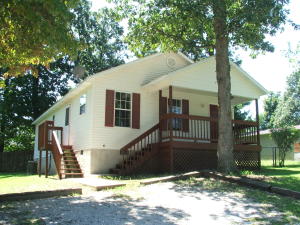 Great value on this neat and clean 3 BR home in convenient location at the north edge of Harrison. New paint and floor coverings. Covered porch! 2x6 exterior walls. Ready to move in! All #'s are approx.