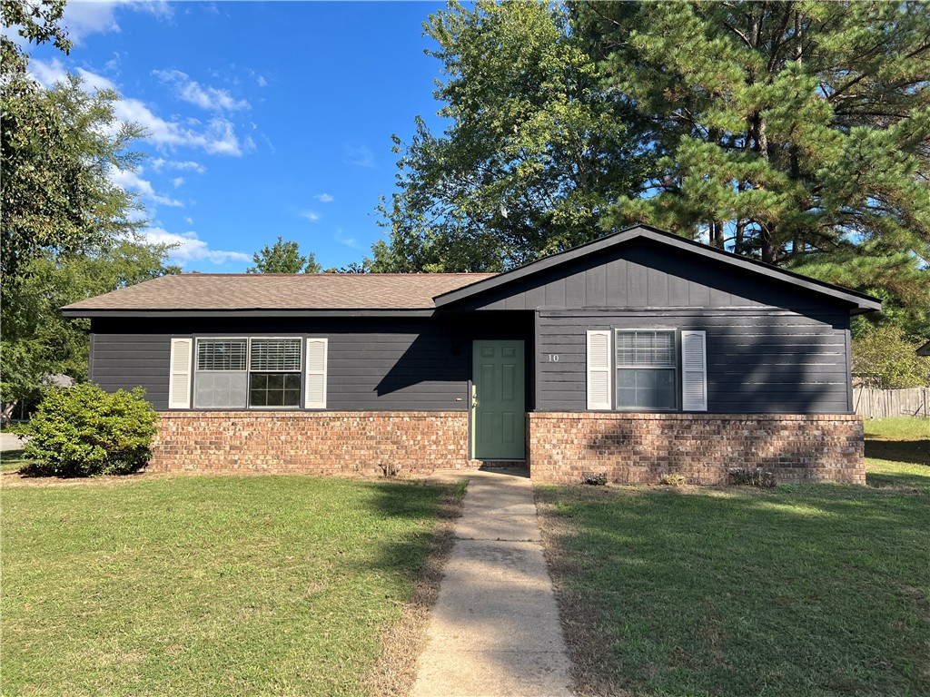 Beautiful setting on a corner lot in the city limits of Clarksville resides this sweet brick home offering 2 bedrooms, 1 full bath, A eat in kitchen and oversized living room all fresh paint and newly remodeled. Enjoy your back patio with lots of trees surrounding you. The home has an attached one car garage with automatic garage door opener. 957 ft.² of heated and cold living space the garage is a 12 x 24 and your back patio is a 12 x 10 concrete slab.