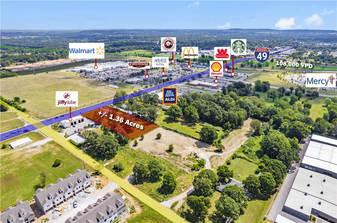 Prime re-development opportunity on +/- 1.36 acres of level land right off Elm Springs Rd, which sees around 17,000 VPD! This piece of land is strategically located near one of the busiest Walmart Supercenters, considered a "Test Store" and just a half mile from I-49, which sees around 108,000 VPD/ Surrounded by excellent neighboring businesses including Aldi, Arvest Bank, Jiffy Lube, Firehouse Subs, Starbucks, Shell Gas Station and more. These businesses help provide a solid local demographic and potential customer base. Sewer is available on the site next door. Currently Zoned C-5 Thoroughfare Commercial, allowing for endless development potential, including, office/retail buildings, medical facilities, hotel, and more! Don't miss out on this ideal site for your next project!