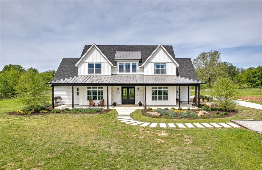 Looking for a dream home? Check out this stunning 5 bedroom, 2.5 bath plus bonus room and office located on a spacious 1.5 +/- acre lot.  Built in 2020, this home boasts the latest in modern design and luxury finishes.  As you step inside, you will be greeted by wood floors that flow throughout the main level.  The heart of the home is the beautiful kitchen with quartz countertops, walk in pantry with a beverage fridge, farmhouse sink, and upgraded GE Cafe appliances. The open concept living room and kitchen area is perfect for entertaining and opens up to a large screened in covered porch with a beautiful view of the back land area.  The front is professionally landscaped and has a wonderful covered front porch. Besides the living room and kitchen on the main level, there is an office, main bedroom, main bath,  utility room (that connects to main bedroom closet), half bath and a mudroom. The upstairs features 4 bedrooms, second bathroom, a bonus room and a large storage room.