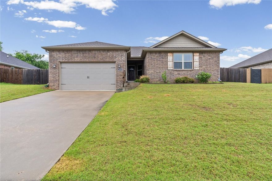 Welcome home to this beautifully maintained 4-bed home in a prime Springdale location, less than 10 minutes to Downtown Springdale & minutes to I-49 for an easy commute! This move-in ready home features a spacious living room with soaring 10-foot ceilings & shiplap detail above the fireplace. The eat-in kitchen offers granite countertops, stainless steel appliances, & plenty of room to gather. You’ll also love the oversized utility room with additional pantry shelving for extra storage & convenience. The private primary suite includes TWO walk-in closets, a whirlpool tub & a separate walk-in shower. Major updates are already in progress, including a BRAND NEW ROOF being installed prior to closing, plus fresh paint scheduled for shutters, front rail/post, garage, & for the back patio posts, adding even more curb appeal & peace of mind for the next owner. Don’t miss this great opportunity to own a spacious home in an excellent location close to shopping, dining, schools & all that Northwest Arkansas has to offer!
