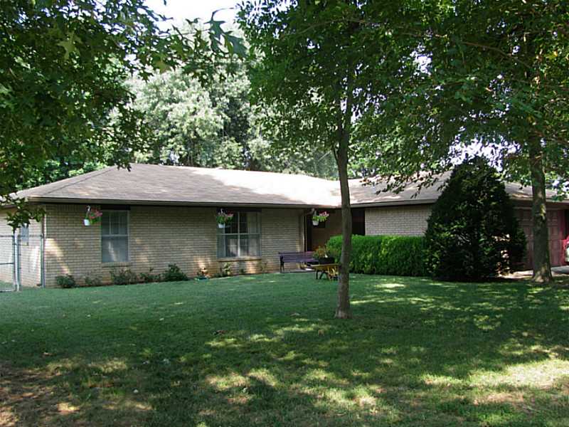 Convenient location, quiet neighborhood, extra parking & storage, clean & well-maintained, nice pantry, refrigerator/washer/dryer convey, upgraded bathrooms & kitchen, wood-burning fireplace w/insert, gas starter & blower, window coverings, large covered,patio, separate irrigation meter at cheaper rate, storage bldg. Fairly new roof, guttering, water heater, double pane patio door & front security door. Seller would consider paying buyer's closing costs. Qualifies for RD, FHA, VA, & Conventional loans.