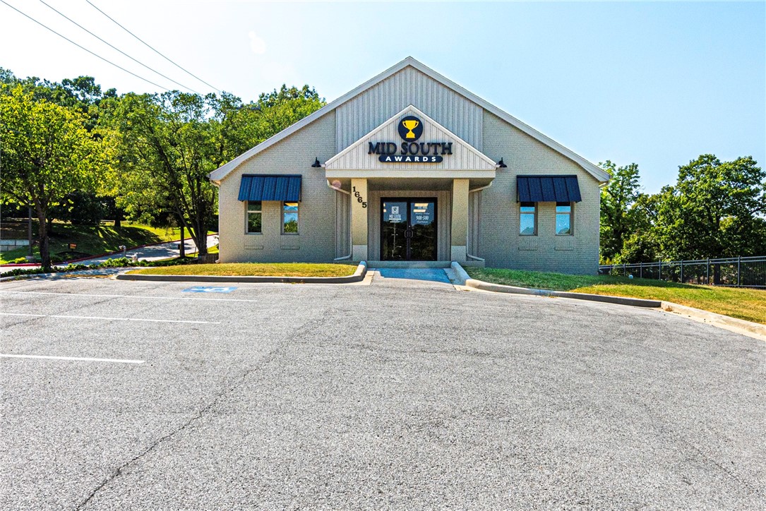 PRIME LOCATION! This 3654 SqFt commercial building with an average of 27,000 traffic count per day is in the middle of the business strip on College Ave! Minutes away from Downtown Fayetteville, the University of Arkansas, and more! This current retail location features both retail space and warehouse space & 11 parking spaces! Currently zoned C-2 the opportunities are endless from government facilities, eating places, amusement facilities, shopping goods, gas stations, drive-in/through restaurants, commercial recreation, office/studios, short-term rentals, and more!