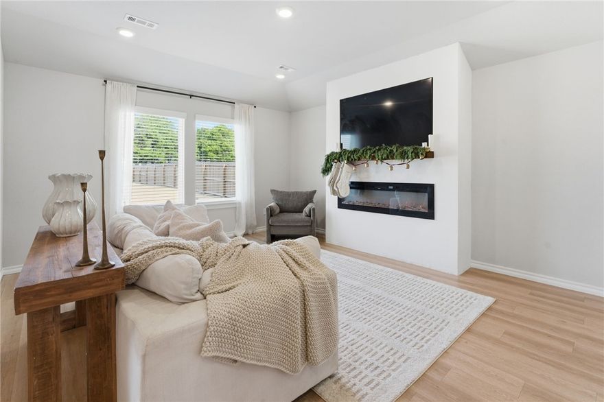 This beautifully maintained single-story brick home, built in 2023, offers modern comfort with thoughtful upgrades already in place, a large and spacious backyard, and a prime location close to downtown. Conveniently situated near the aquatic center, schools, shopping, John Brown University, and easy access to Highway 412, this home blends everyday convenience with comfortable living.
The sellers have enhanced the home with a cozy living room fireplace, added fencing for privacy, a concrete patio slab perfect for outdoor entertaining, and kitchen backsplash. Inside, the home is filled with natural light, creating a warm and welcoming atmosphere throughout. Enjoy generous space, walk-in closets, quartz countertops, and abundant storage. With quality construction, contemporary finishes, and numerous upgrades already completed, this move-in-ready home offers the feel of new construction without the wait—a perfect blend of style, practicality, and low-maintenance living.