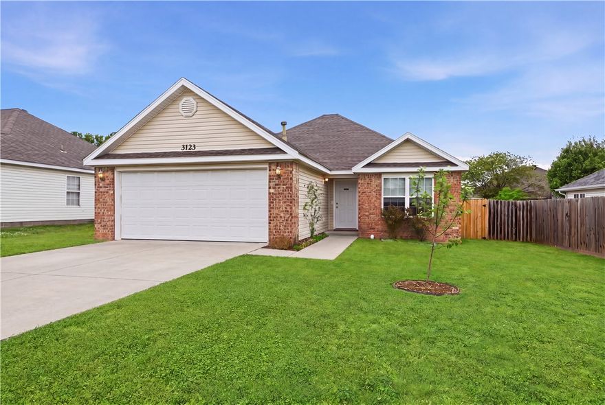 Welcome to 3123 Rocky Branch Ave in Springdale's Hidden Lake subdivision! This charming 3-bedroom, 2-bath brick home offers 1,262 sq ft of comfortable living, priced at $265,000. Recent updates make this one truly move-in ready —  roof, water heater, and AC were all replaced in 2017, plus a replaced sliding glass door and front window, and fresh paint throughout. The kitchen features granite counters and a pantry, while the cozy gas fireplace is perfect for cooler evenings. Step outside to a fenced backyard with a patio, storage shed, and mature cherry, apple, and peach trees — your own private retreat. The attached 2-car garage adds everyday convenience. Ideally located with quick access to Hwy 412, the Razorback Greenway, and just minutes from Knapp Elementary and JO Kelly Middle School. Don't miss this gem!