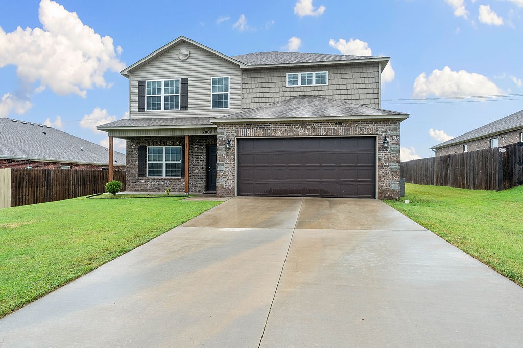 Beautiful east-facing 2020 4-bedroom home (4br, 2.5ba, 2362sqft!) w/ all the upgrades in the Bentonville school district -- including new high-end fridge, washer, and dryer! Don't miss your chance at this well-maintained affordable home with huge yard as well as no neighbors behind (privacy!). Master suite & additional guest bathroom on first floor. Two living areas (huge bonus room upstairs!) and 3 additional bedrooms upstairs.. Other features & upgrades include: luxury vinyl plank flooring throughout entire 1st floor, granite countertops, 9ft ceilings, canned lighting, ring doorbell, stainless steel appliances, & tiled kitchen backsplash.