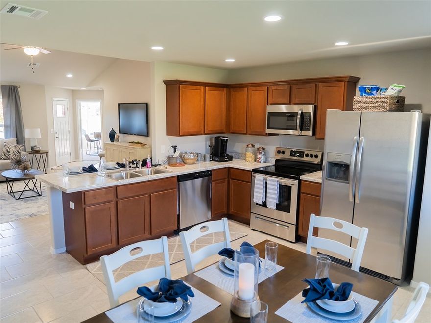 The gorgeous Kinsley plan is loaded with curb appeal with its welcoming covered front porch and front yard landscaping. This home features an open floor plan with 4 bedrooms, 2 bathrooms, and a spacious living area. Also enjoy a beautiful dining area/kitchen fully equipped with energy-efficient appliances, generous counter space, and a convenient pantry for ease of meal preparation. Learn more about this home today! *Photos are of similar model