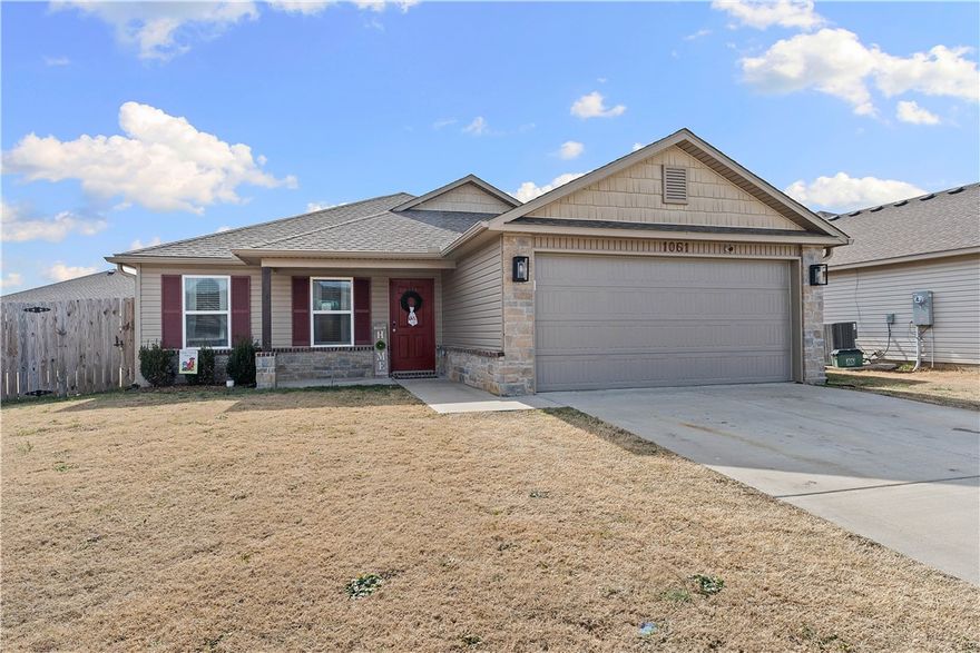 Welcome to an ideal location, only 5 minutes to U of A campus, 8 minutes to Dickson St. in Downtown Fayetteville, and under 10 minutes to the VA Medical Center!
This newer-built 3-bedroom, 2-bathroom home sits on a spacious corner lot with privacy and a large fenced backyard. This one-owner home has been meticulously maintained.
As you enter, enjoy the open-concept living space seamlessly connecting the living room, dining area, and kitchen—perfect for entertaining.
The master includes an ensuite bathroom for convenience and privacy, plus a walk-in closet. The other bedrooms share a well-designed second bath with modern fixtures and finishes.
Thoughtful upgrades include ceiling fans in all rooms and on the back porch, solar ambient lighting on the fencing, added gutters, industrial garage hooks, upgraded toilets, filtered shower heads, and more.
Most appliances convey with full-price offer, including washer and dryer. (See MLS remarks for details.) Refrigerator conveys only with an acceptable cash offer.