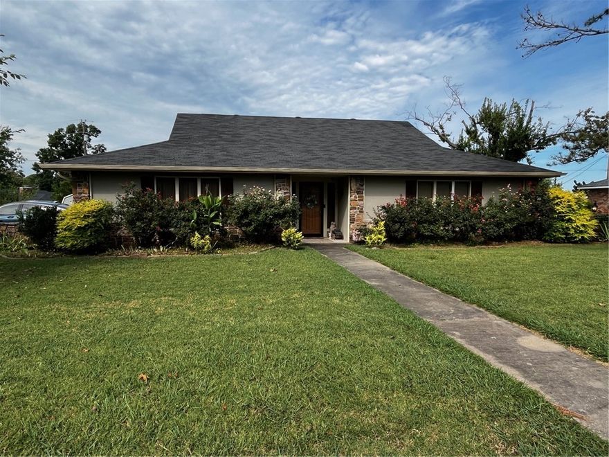 Wonderful home on oversized lot in an established neighborhood.  2 sunrooms, one is private off of the primary bedroom.  Large living room with rock fireplace.  3 bedrooms PLUS 4th flex room. Granite counters, vaulted LR ceiling, two storage sheds, walk in closets throughout.