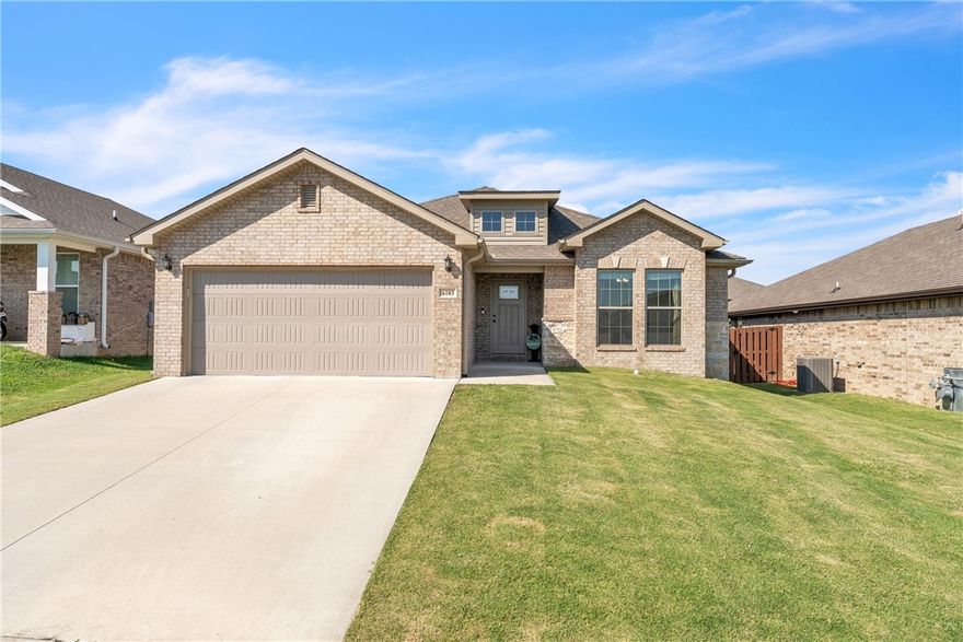 Beautiful 3-bedroom, 2-bath home in Bentonville! This thoughtfully designed floor plan showcases a beautifully crafted brick and stone exterior and a spacious open-concept layout with 10-foot ceilings in the living area and kitchen. Enjoy a cozy corner fireplace, perfect for relaxing or entertaining. The large primary suite offers a private retreat with a grand walk-in closet and ensuite bath. Conveniently located near Bentonville schools, parks, and local amenities, this home combines comfort, style, and functionality in one inviting package.