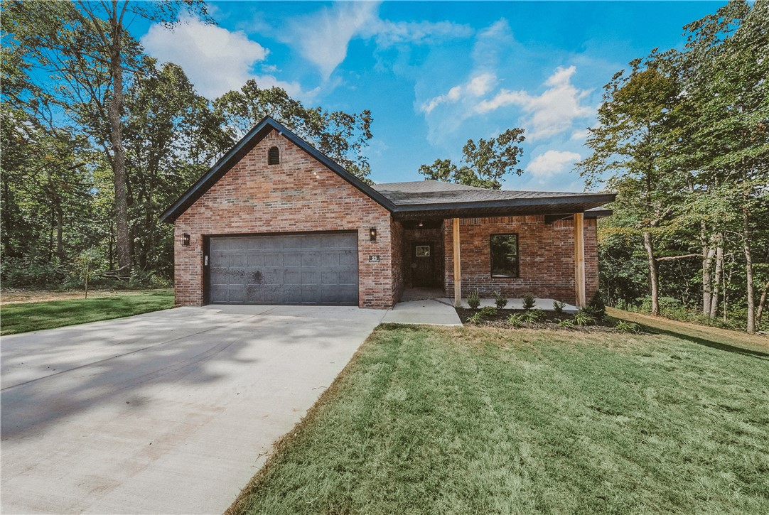 Brand New Construction in Bella Vista! Situated on a quiet cul-de-sac just minutes from Branchwood Recreation Center, this beautifully built home offers the perfect mix of modern design and natural surroundings. The open floor plan is filled with natural light and features bright, inviting paint tones and hard surface flooring throughout. The kitchen showcases stunning granite countertops and quality finishes, ideal for both daily living and entertaining. Enjoy the peaceful setting, large level lot located on a quiet level lot with access to Bella Vistaās incredible amenities, and move-in-ready convenience. A fantastic opportunity in a prime location! $3000 preferred lender credit available to qualified buyers and a two year builders warranty.