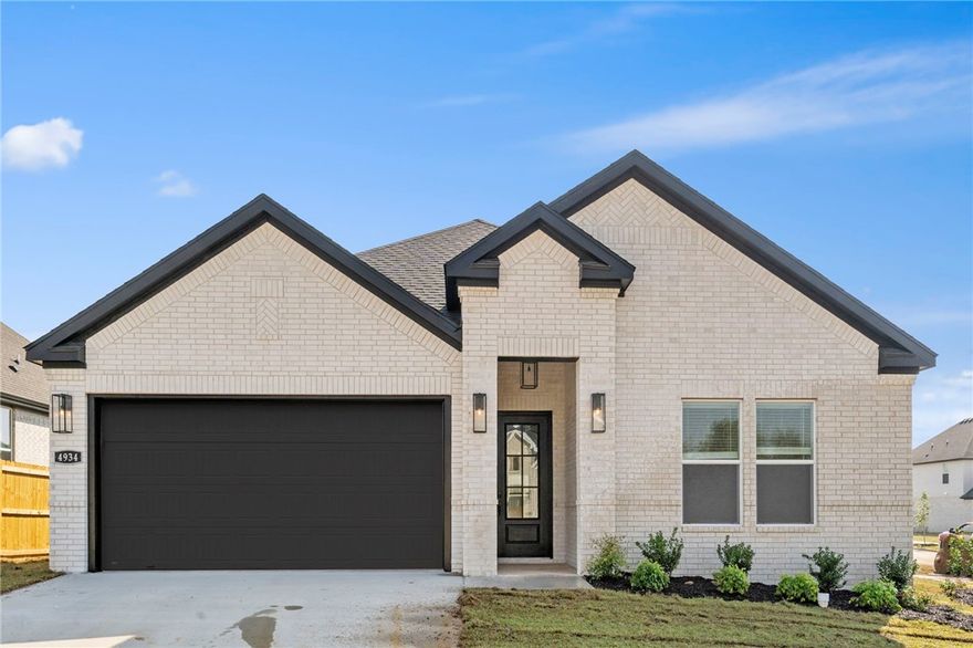 Sold before print! Lovely Ivory plan in Henderson Park, located in Fayetteville! The Ivory plan has 2500 square feet with 4 bedrooms, 3 baths. 4-sided brick. 2-inch blinds throughout! This plan also includes a game room on the second floor with a full bath and a closet so this can be used as an extra bedroom.   These homes will be 4-sided Brick. Flooring is Wood Laminate plank flooring and carpeting in the secondary bedrooms and game room! The Kitchen will have an oversized kitchen island, quartz countertops and 42-inch upper cabinets with top molding with an Upgraded Stainless steel appliance package. The Living room will have a Beautiful Gas Fireplace. LED lighting throughout! Ceiling fans!  High efficiency air conditioner system with Programmable WI-FI thermostat! Tankless hot water heater! Bedroom one will have double sinks, oversized walk-in shower, and a SOAKING TUB!! Covered Patio! Gutters included!  Springdale Schools. Taxes TBD.