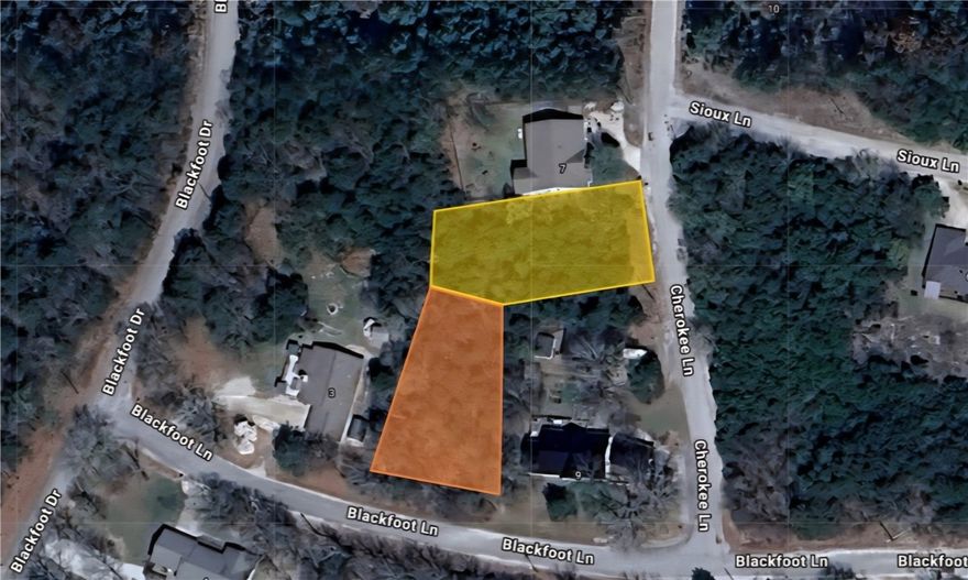 It is time to build your new home in the beautiful area of Holiday Island and start enjoying the lake life. The .58 (+/-) acre lot consists of 2 conjoining lots that is flat with a few trees. The second address is Lot 22 on Cherokee Lane. It is close to local amenities, marinas and fun the town of Eureka Springs. The property conveys a Limited Warranty Deed only. Owner financing is available. Manufactured/mobile/tiny homes are not allowed. Call or text for more information.