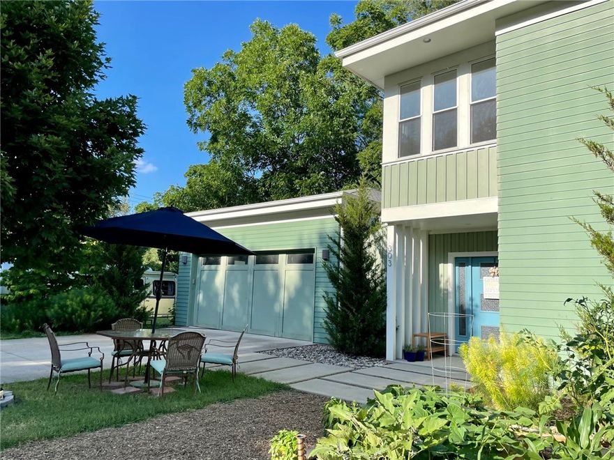 SOLD BEFORE PRINT. Incredible custom energy efficient home filled with amazing features just 3 blocks from the square. This well planned home has one bedroom with ensuite on the main level and three bedrooms up with 2 baths and nook area. This home is very green featuring solar panels, organic garden and energy star rated appliances. You will love the open feel and incredible natural light.