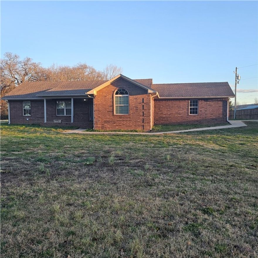 Tours start 2/2/2026. Private country living with convenient access to town! Located at 4546 AR 105 in Atkins, this home sits on a peaceful 3-acre lot while remaining just minutes from schools, restaurants, and shopping. The flexible floor plan offers 4 bedrooms and 2 bathrooms, or 3 bedrooms with a bonus room ideal for a home office, playroom, or extra living space. Enjoy outdoor living on the covered patio, perfect for relaxing or entertaining, and take advantage of the outbuilding for storage, hobbies, or a workshop. This property offers space, privacy, and versatility without sacrificing location—an ideal blend of country feel and everyday convenience.