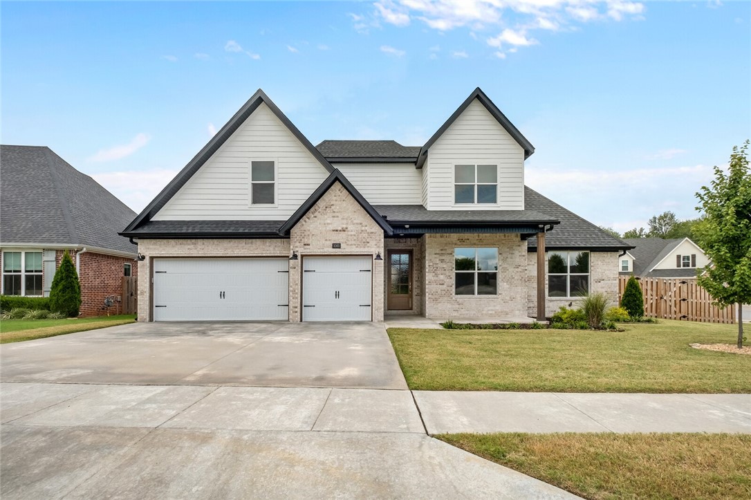Under 5 miles from Walmart Home Office. This beautiful custom built home offers modern comfort, many upgrades, & open concept living space. Step inside to an open layout featuring a living room w/ fireplace, & plenty of natural lighting. The kitchen has plenty of countertop space, eat-in kitchen, stainless steel appliances, gas cooktop, pantry & more. Relax in the Primary suite boasting a spacious bathroom w/ soaking tub, tiled shower, his & hers vanities, & walk-in closet w/ lots of room. Enjoy a beautiful oversized backyard w/ covered patio.