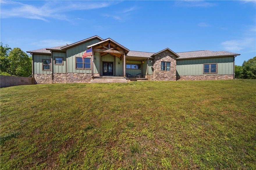 Built with energy in mind, from its high Seer heat and air units, high R value insulation, and insulated concrete form basement walls, this home has it all.  Sitting on almost 80 acres with large fields, tall trees, and pond this property has everything to escape the hustle and bustle.  With a 3105 sq ft shop next to the  home you have room for campers, atvs, utvs, tractors, and more.  Own a piece of the Ozarks while only being ~30 mins from downtown Bentonville.