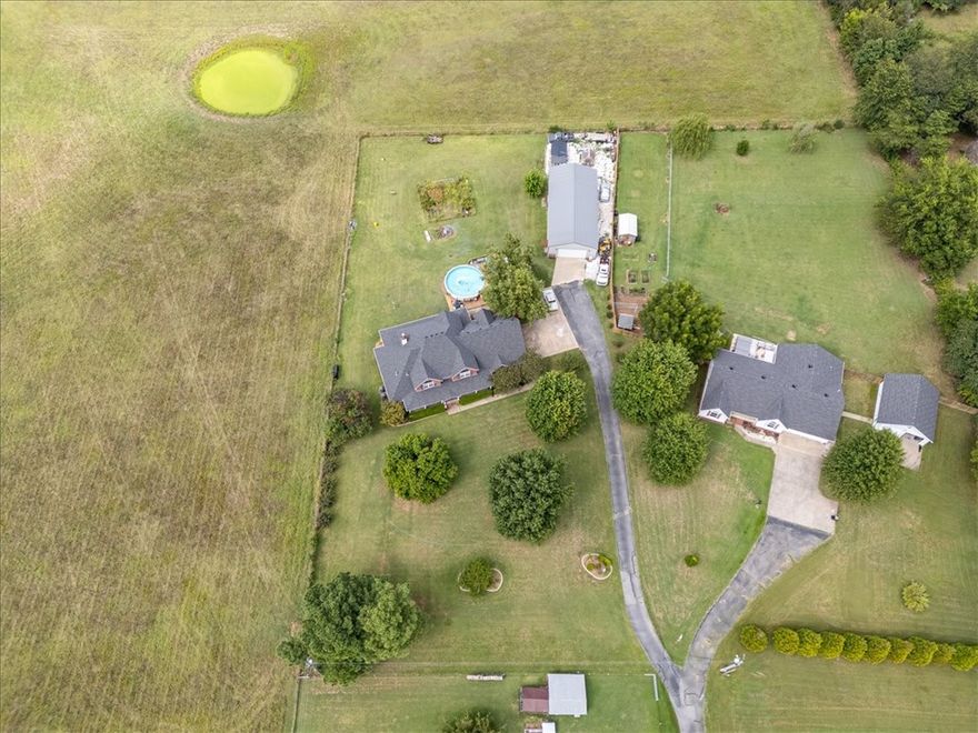 Rare opportunity to own a fully upgraded 3,564 sq ft home with a 30x65 shop on 1.5 acres—minutes from Fayetteville. Inside the expansive 30x65 shop, you will find a 30x15 section that is climate controlled and has separate access. Ideal for a business, vehicles, equipment, or hobbies, the shop offers hard-to-find functionality. The home features updated finishes, a spacious layout, plus a newer roof and windows for added peace of mind.

Inside offers multiple living areas, a theater room, and flexible space for living, entertaining, or working from home. Outside, enjoy room to spread out with a chicken coop, garden space, or future expansion.

Located in Farmington with quick access to Fayetteville—combining convenience, versatility, and space.