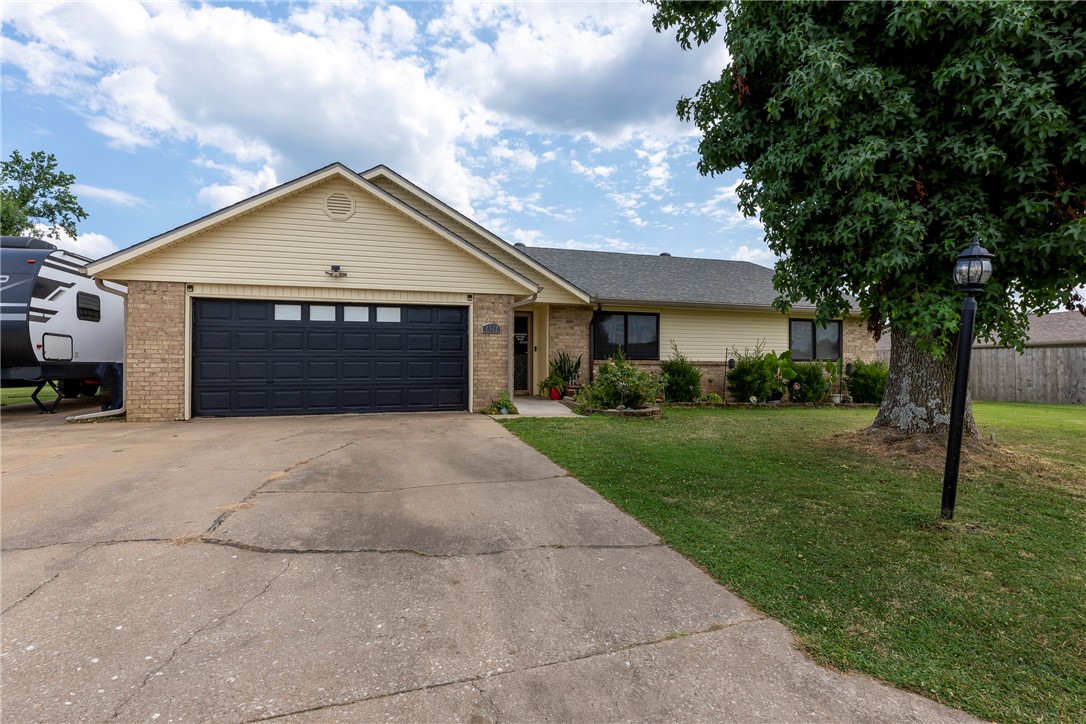 Tucked in well-established Northwest Arkansas neighborhood, this charming ranch style home offers updates where it matters mostākitchen, new roof and AC, mini split in the garage. The spacious living room provides a welcoming space for relaxing or entertaining, while each bedroom features a large walk-in closet for plenty of storage. Disabled tub and shower is also jetted. The s.f. does not include 150 heated and cooled s.f. in the sunroom. Enjoy year-round comfort in the enclosed patio and take advantage of the storage shed for tools or hobbies. Conveniently located near Promenade Mall, schools, and medical facilities. This home delivers both peace and practicality. A must-see!