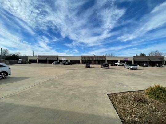 Fully leased strip center with 2 additional lots totaling 1.48 acres.