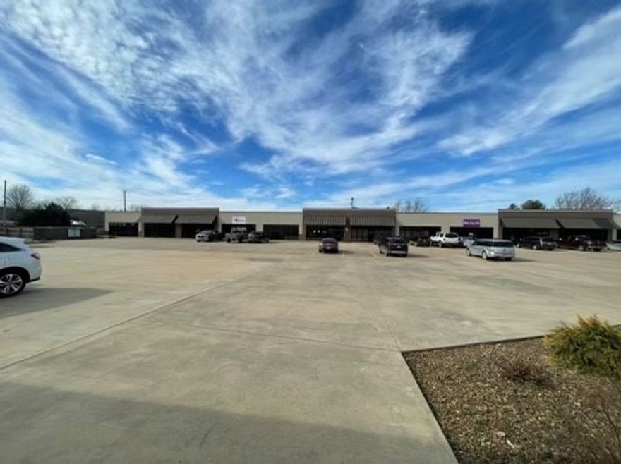 Fully leased strip center with 2 additional lots totaling 1.48 acres.